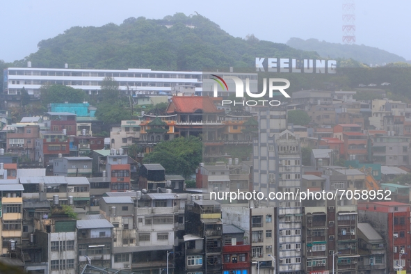 Houses in a hill in Keelung under strong rains and winds in Keelung, as Typhoon Chanthu bringing torrential rains and damaging winds makes l...
