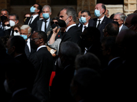 King Felipe VI of Spain (C ) and other guests attend the funeral ceremony for the late former Portuguese President Jorge Sampaio at Jeronimo...