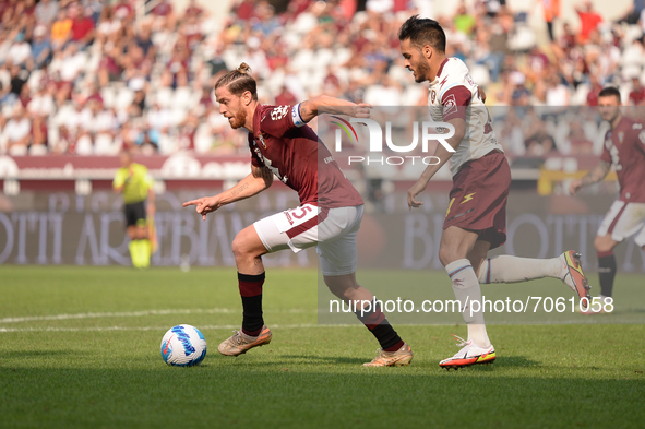 Cristian Ansaldi of Torino FC  and Wajdi Kechrida of US Salernitana during the Serie A match between Torino FC and US Salernitana at Stadio...