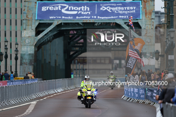 The medical motorbike crosses the Tyne Bridge during the BUPA Great North Run in Newcastle upon Tyne, England on Sunday 12th September 2021....