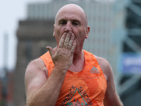 A runner blows a kiss during the BUPA Great North Run in Newcastle upon Tyne, England on Sunday 12th September 2021.  (