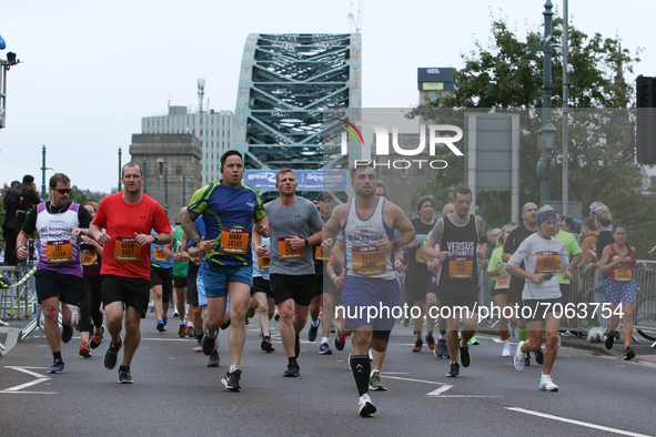 Runners cross the Tyne Bridge during the BUPA Great North Run in Newcastle upon Tyne, England on Sunday 12th September 2021.  