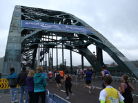 Runners run on the Tyne Bridge during the BUPA Great North Run in Newcastle upon Tyne, England on Sunday 12th September 2021.  (