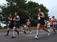 Runners in action during the BUPA Great North Run in Newcastle upon Tyne, England on Sunday 12th September 2021.  (