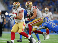 San Francisco 49ers tight end George Kittle (85) runs the ball during the second half of an NFL football game against the Detroit Lions in D...