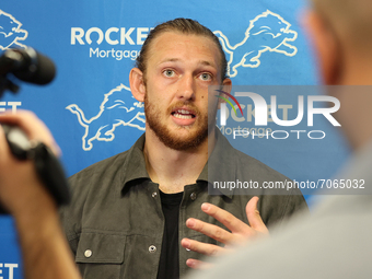 Detroit Lions tight end T.J. Hockenson (88) is interviewed in the press room after an NFL football game between the Detroit Lions and the Sa...