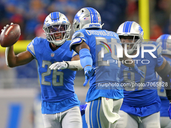 Detroit Lions cornerback Ifeatu Melifonwu (26) and teammates celebrate after a fumble recovery during the second half of an NFL football gam...