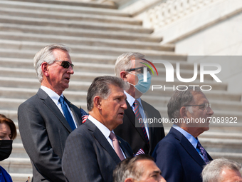 Senator Tommy Tuberville, Republican of Alabama and staunch Trump supporter, faces and sings along with the US Army Band quartet singing 