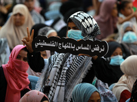 Palestinians take part in a protest against the United States and UNRWA signing a Framework for Cooperation, in Gaza city on September 14, 2...