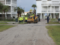 Cleanup crews move through the neighborhood of Pirate’s Beach on Galveston Island to clear the debris from the storm. September 14th, 2021....