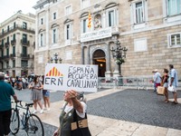 Protester in front of the Generality of Catalonia is seen with a banner that says, Spain recovers Catalonia.
The political party The Popular...