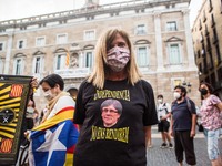 Protester in front of the Generality of Catalonia is seen with a shirt with the face of the former president of the Generality of Catalonia,...