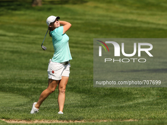 Katie Burnett of Brunswick, GA follows her shot from the rough toward the 7th green during the final round of the Marathon LPGA Classic golf...