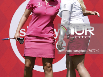 Caroline Masson of Germany hugs Brittany Lincicome of Seminole, FL after making her putt on the 18th green during the final round of the Mar...
