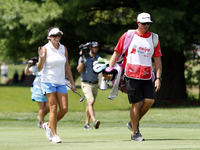 Gerina Piller of Roswell, New Mexico greets the crowd as she approaches the 18th green during the final round of the Marathon LPGA Classic g...