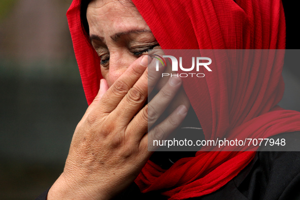 An Afghan national breaks down during a protest against Pakistan's alleged support to the Taliban, in New Delhi, India on September 16, 2021...
