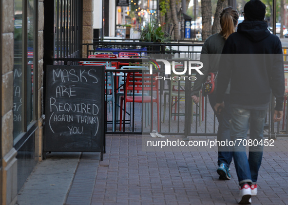 SIgn 'Masks Are Requested' seen outside a restaurant on Whyte Avenue in Edmonton.
Alberta has declared a state of public health emergency an...