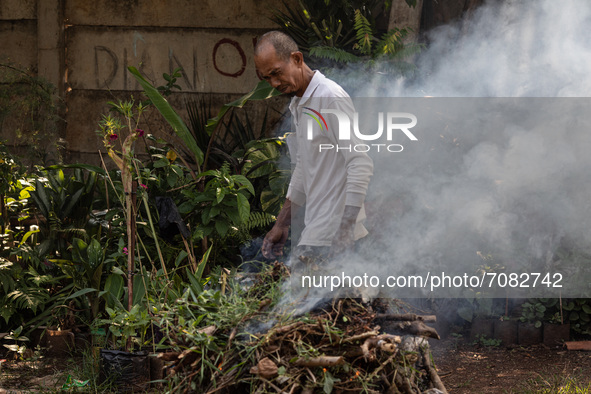 Pak KODIR burned grass waste from the plantation. Land for rice farming and farming in southern Tangerang, Indonesia on September 17, 2021 h...