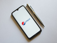 In this photo illustration a Pepsi logo is display on a smartphone screen and a pencil in Athens, Greece on September 17, 2021. (