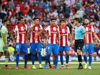 Referee shows red card to Joao Felix of Atletico de Madrid during the La Liga match between Atletico de Madrid and Athletic Club Bilbao at W...