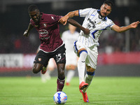 Cedric Gondo of US Salernitana 1919 and Jose’ Luis Palomino of Atalanta BC compete for the ball during the Serie A match between US Salernit...