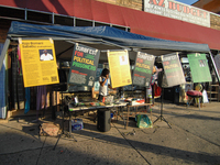 A DJ spins his tables while tabling for political prisoners in front of a shop on Chelten Ave, during a rally in the Germantown neighborhood...