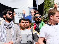 Afghan demonstrators in front of a portrait of Ahmad Massoud in Paris, in Paris, France, on September 19, 2021. (