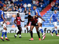  Oldham Athletic's Kyle Jameson tussles with Mike Fondop of Hartlepool United during the Sky Bet League 2 match between Oldham Athletic and...