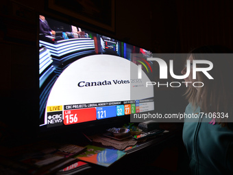 A woman watches the election results live on CTV News.
Early election results predict Liberal leader Justin Trudeau to win enough seats in t...