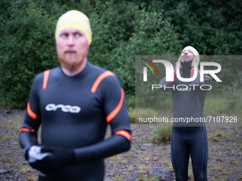 Two athletes at the Swim start, at Swedeman 2021 in Åre, Sweden (