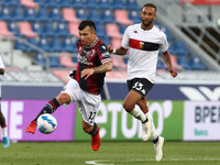 Gary Medel (Bologna F.C.) (left) competes for the ball with Hernani (Genoa CFC) during the Italian Serie A soccer match Bologna F.C. vs Geno...
