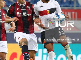 Kevin Bonifazi (Bologna F.C.) (left) in action with Hernani (Genoa CFC) during the Italian Serie A soccer match Bologna F.C. vs Genoa C.F.C....