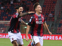 Aaron Hickey (Bologna F.C.) celebrates  with Roberto Soriano after scoring goal 1-0 during the Italian Serie A soccer match Bologna F.C. vs...