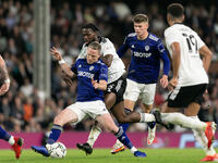 Joshua Onomah of Fulham and Adam Forshaw of Leeds United battle for the ball during the Carabao Cup match between Fulham and Leeds United at...