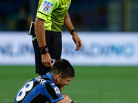 The referee Massa checks on Rusland Malinovskyi (Atalanta Bergamasca Calcio) on the ground after a hard foul during the Italian football Ser...