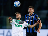 Domenico Berardi (U.S. Sassuolo) hindered by Berat Djimsiti (Atalanta Bergamasca Calcio) during the Italian football Serie A match Atalanta...