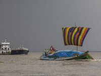 Bulkhead sails through The Padma River in Manikganj, Bangladesh on September 20, 2021. (