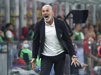 Stefano Pioli head coach of AC Milan reacts during the Serie A match between AC Milan and Venezia FC at Stadio Giuseppe Meazza on September...