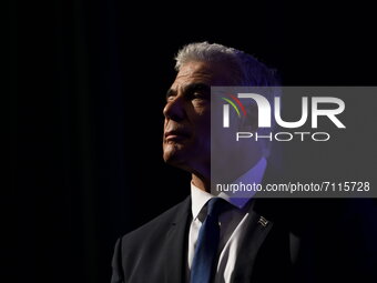 Israeli Foreign minister and Yesh Atid party chairman Yair Lapid speaks at a Yesh Atid party conference marking 100 days for the formation o...