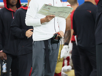 San Francisco 49ers head coach Kyle Shanahan looks on from the sidelines during an NFL football game between the Detroit Lions and the San F...