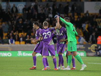 Spurs celebrate winning the penalty shoot-out during the Carabao Cup match between Wolverhampton Wanderers and Tottenham Hotspur at Molineux...