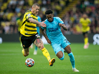 Joe Willock of Newcastle and Juraj Kucka of Watford battle for the ball during the Premier League match between Watford and Newcastle United...