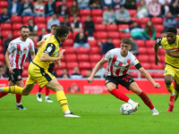 Sunderland's Daniel Neil takes on the Bolton defence during the Sky Bet League 1 match between Sunderland and Bolton Wanderers at the Stadiu...
