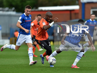 Oldham Athletic's Dylan Bahamboula tussles with Jeriel Dorsett of Rochdale AFC during the Sky Bet League 2 match between Rochdale and Oldham...