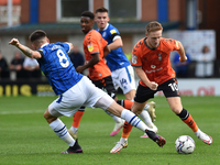 Oldham Athletic's Davis Keillor-Dunn tussles with Aaron Morley of Rochdale AFC during the Sky Bet League 2 match between Rochdale and Oldham...