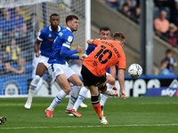 Oldham Athletic's Davis Keillor-Dunn scores his side's first goal of the game during the Sky Bet League 2 match between Rochdale and Oldham...