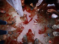 Shiite muslims take part in ritual self-flagellation during a procesion of ' Chehlum'  , in the old streets of Allahabad, India  on Septembe...