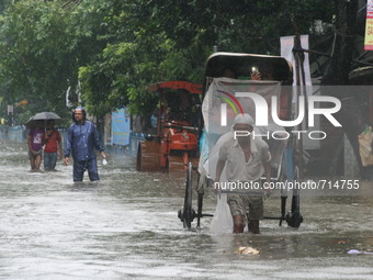 The water luggage’s KOlkata Amar Street    under heavy rain from Cyclone Komen in Kolkata on August 01, 2015. The cyclone made landfall in B...