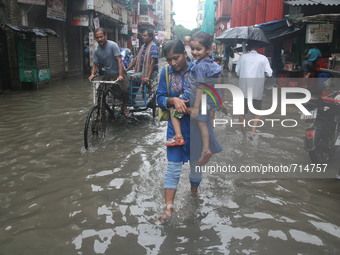 The water luggage’s KOlkata Amar Street    under heavy rain from Cyclone Komen in Kolkata,India  on August 01, 2015. The cyclone made landfa...