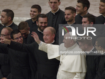 Pope Francis meet a group of priests at the end of his weekly general audience on September 29, 2021 in the Paul VI hall at the Vatican.  (